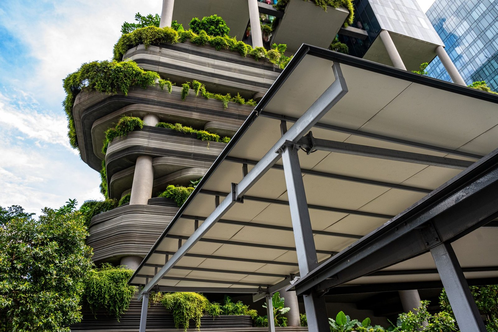 Stunning modern architecture in Singapore with lush greenery integrated into the building design.